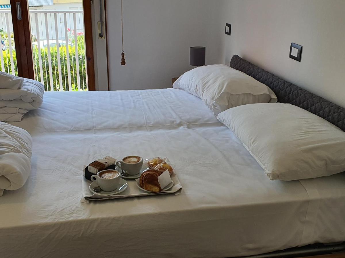 Miga Hotel Grado Centro Bagian luar foto